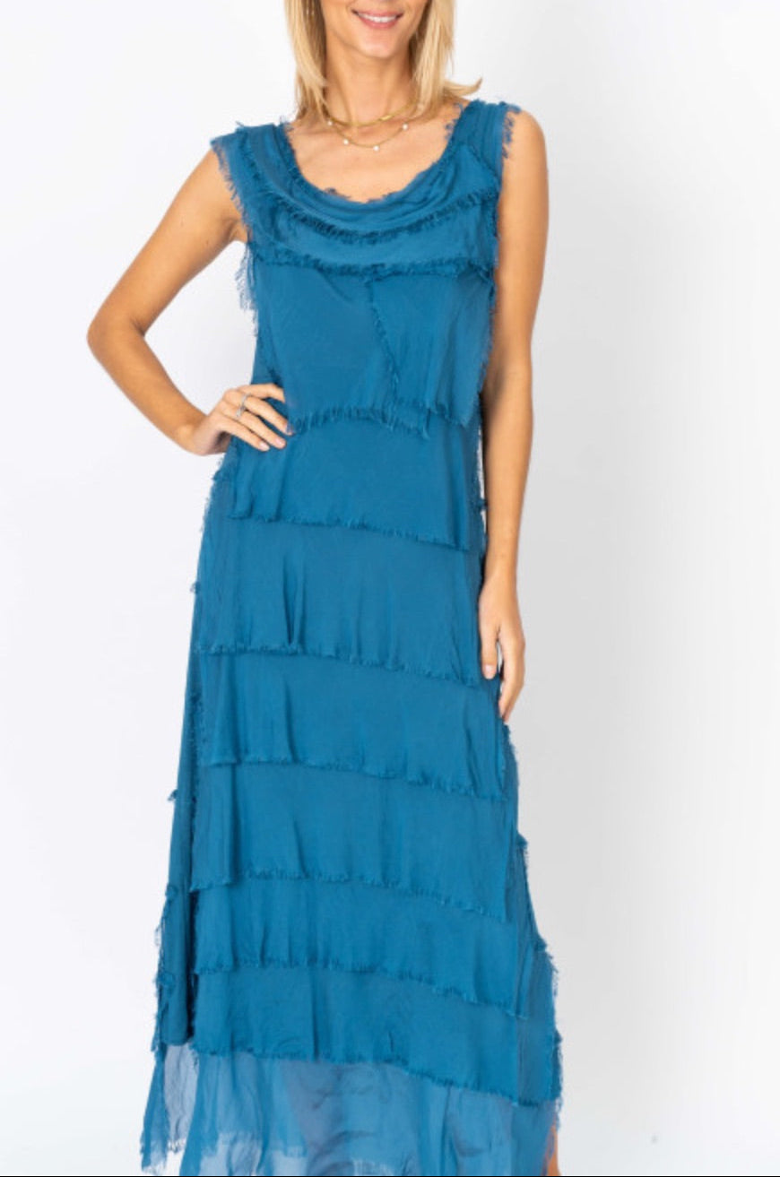 Model wearing the Briella Silk Dress in Prussian blue, Italian-made with tiered silk layers and a soft jersey bodice.