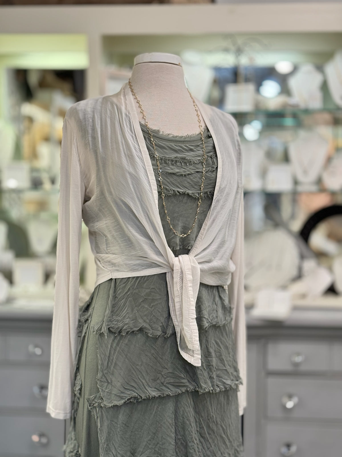 Briella Silk Dress in Olive styled with beige silk wrap cardigan
