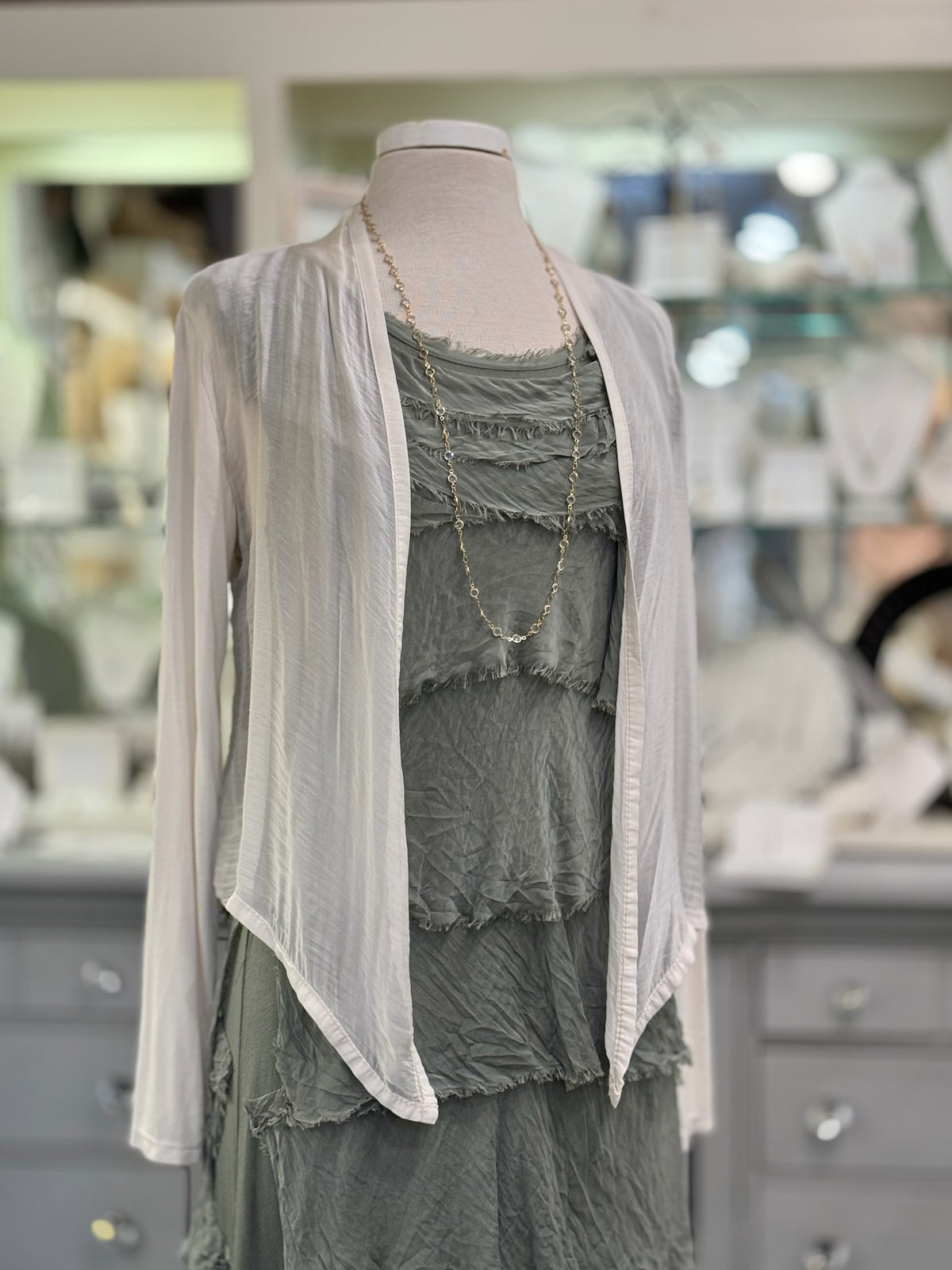 Briella Silk Dress in Olive styled with beige silk wrap cardigan open