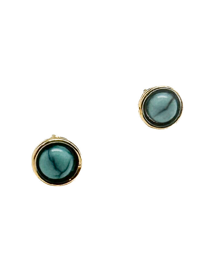A pair of round stud earrings with blue stones set in gold settings, shown on a plain white background.