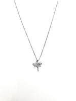Butterfly pendant necklace on a white background