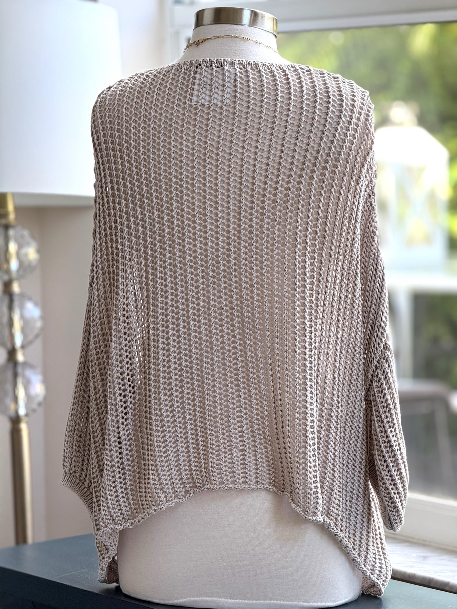 Cecilia crochet sweater in beige shown on mannequin back view 