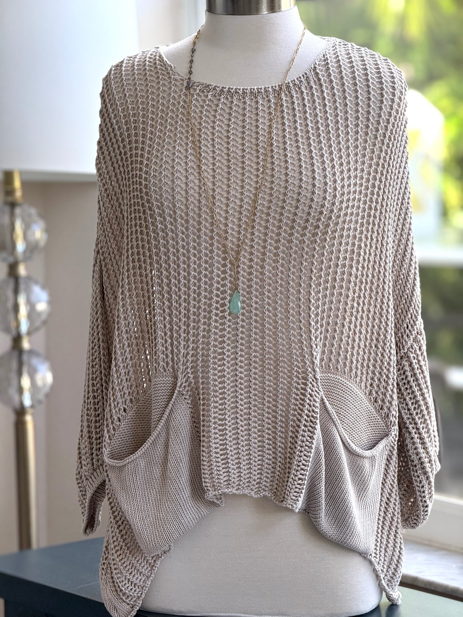 Cecilia crochet sweater in beige shown on mannequin front view 