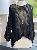Cecilia crochet sweater in black shown on mannequin front view 