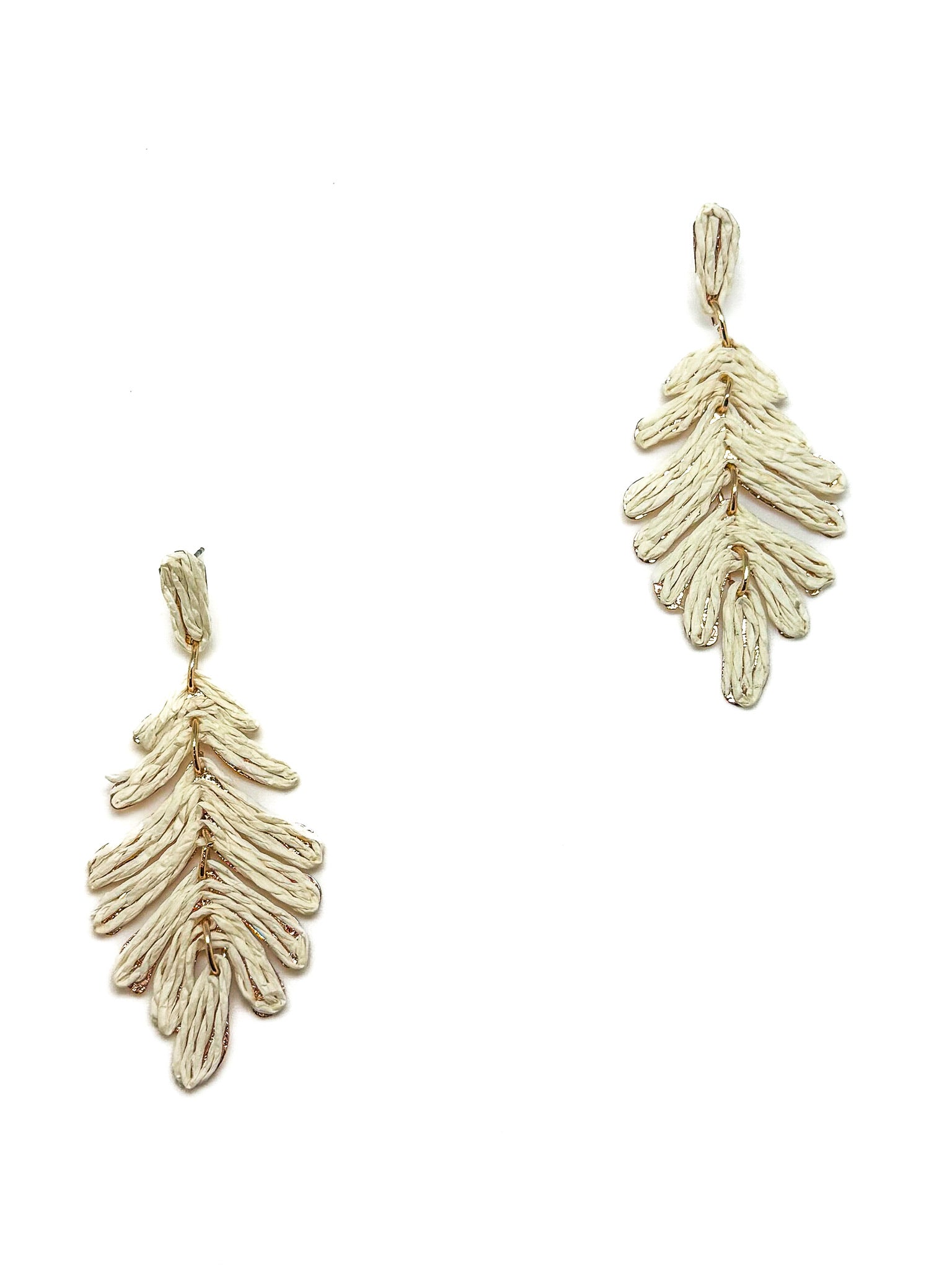 Charisma Earrings in Cream. Featuring a natural texture and leaf inspired design