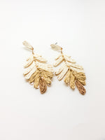 Charisma Earrings in Tan and Beige. Ombre starts with a cream color at the top and graduates to warm beige and tan at the very end.