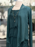 Chloe Silk Cardigan in peacock green shown worn open with layered Nina Halls necklaces