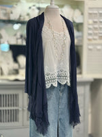 Clara Silk Cardigan in Navy over white lacy tank and denim bottoms. Paired with silver pearl necklace