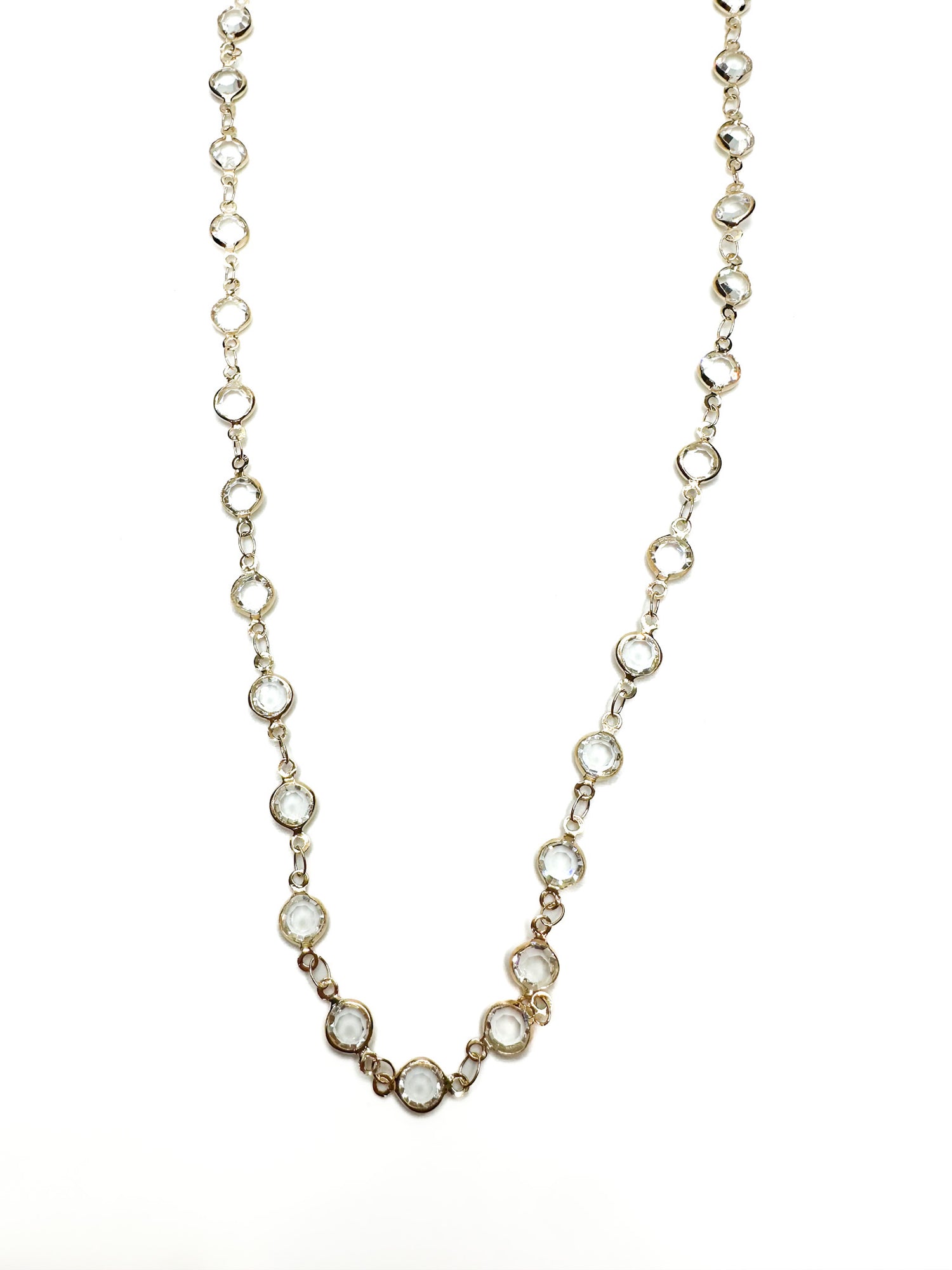Delicate necklace with small pearls on a white background