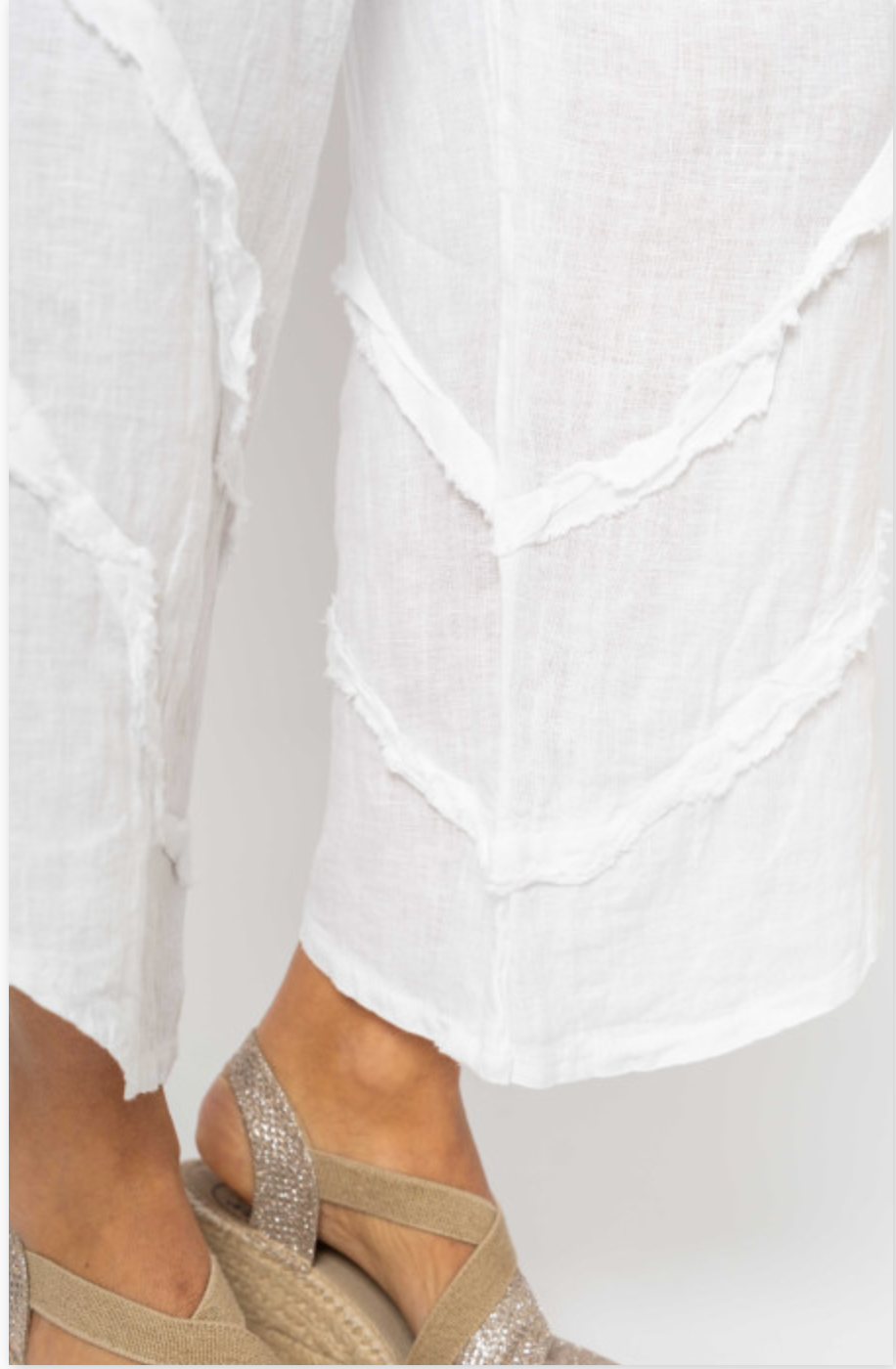 Close detail shot of fray ruffle on leg of Tia pants