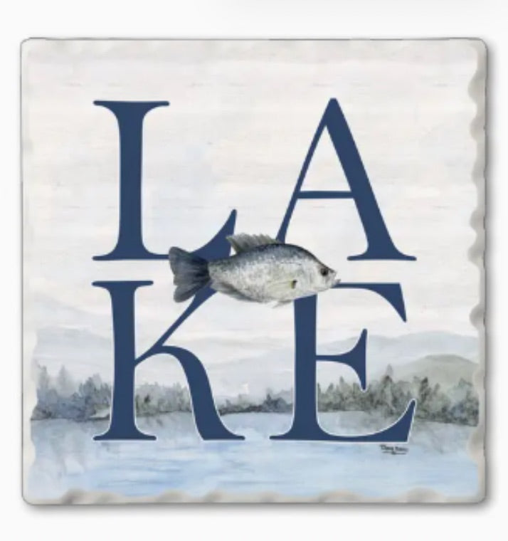 Square decorative tile coaster featuring a watercolor-style lake scene with large navy blue letters spelling 'LAKE' and a fish illustration across the center.