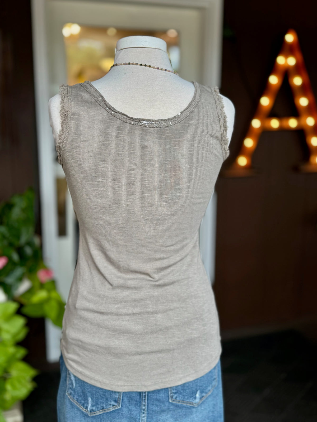 Back view of the Elisa Sequin Tank in taupe showing its sleeveless silhouette, lightweight cotton knit and easy fit at Ardor Boutique.