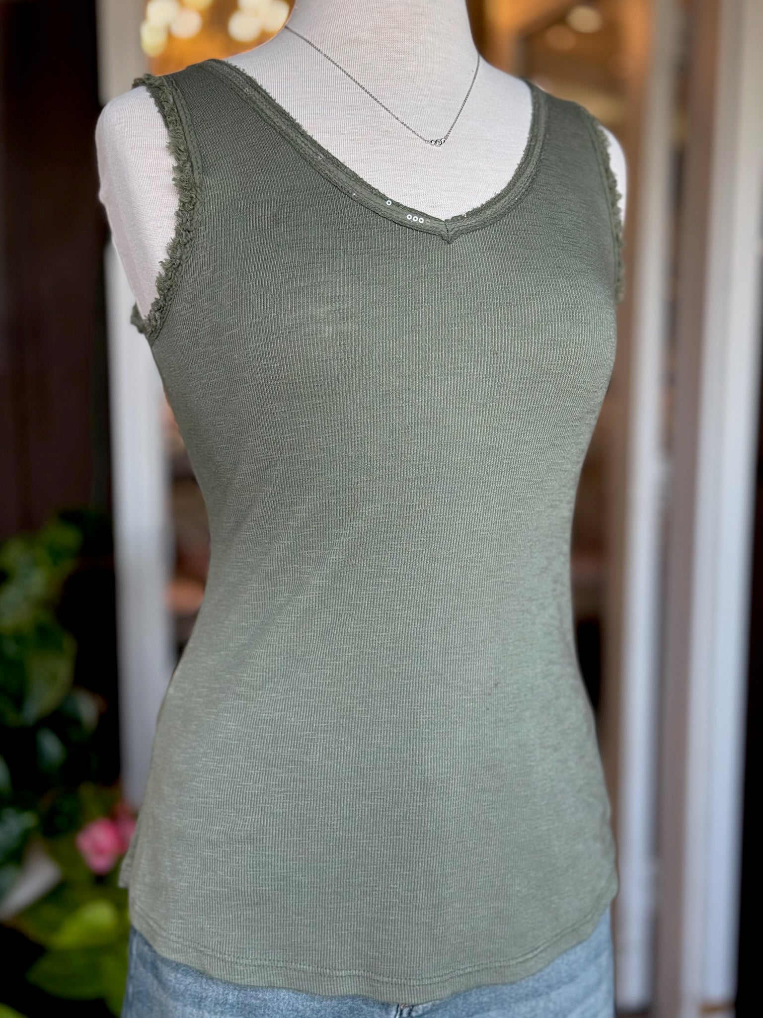 Elisa Sequin Tank in olive on mannequin at Ardor Boutique