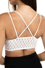 back of white lace bralette