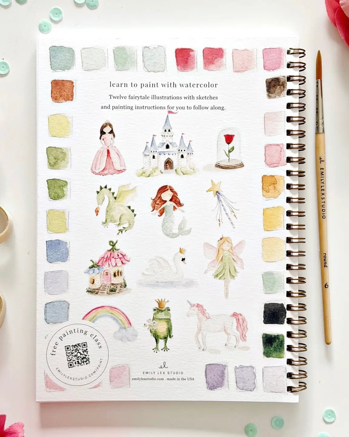 Back cover of the Fairytale watercolor workbook showing whimsical illustrations including princess castle unicorn dragon and fairy