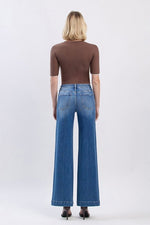 Back view of The Fallon Jean showcasing classic five-pocket design and trouser hem