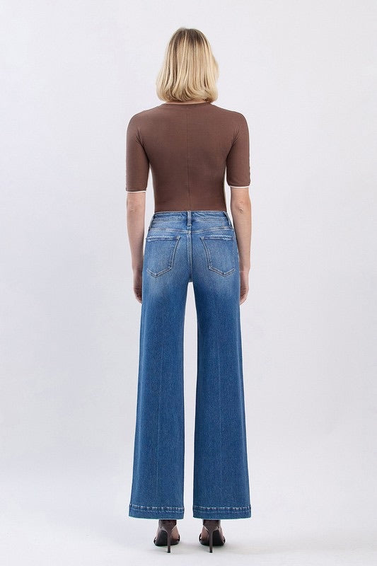 Back view of The Fallon Jean showcasing classic five-pocket design and trouser hem