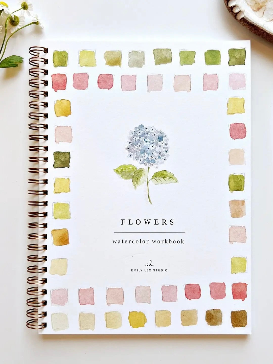 Flowers watercolor workbook by Emily Lex with a spiral binding on a white background