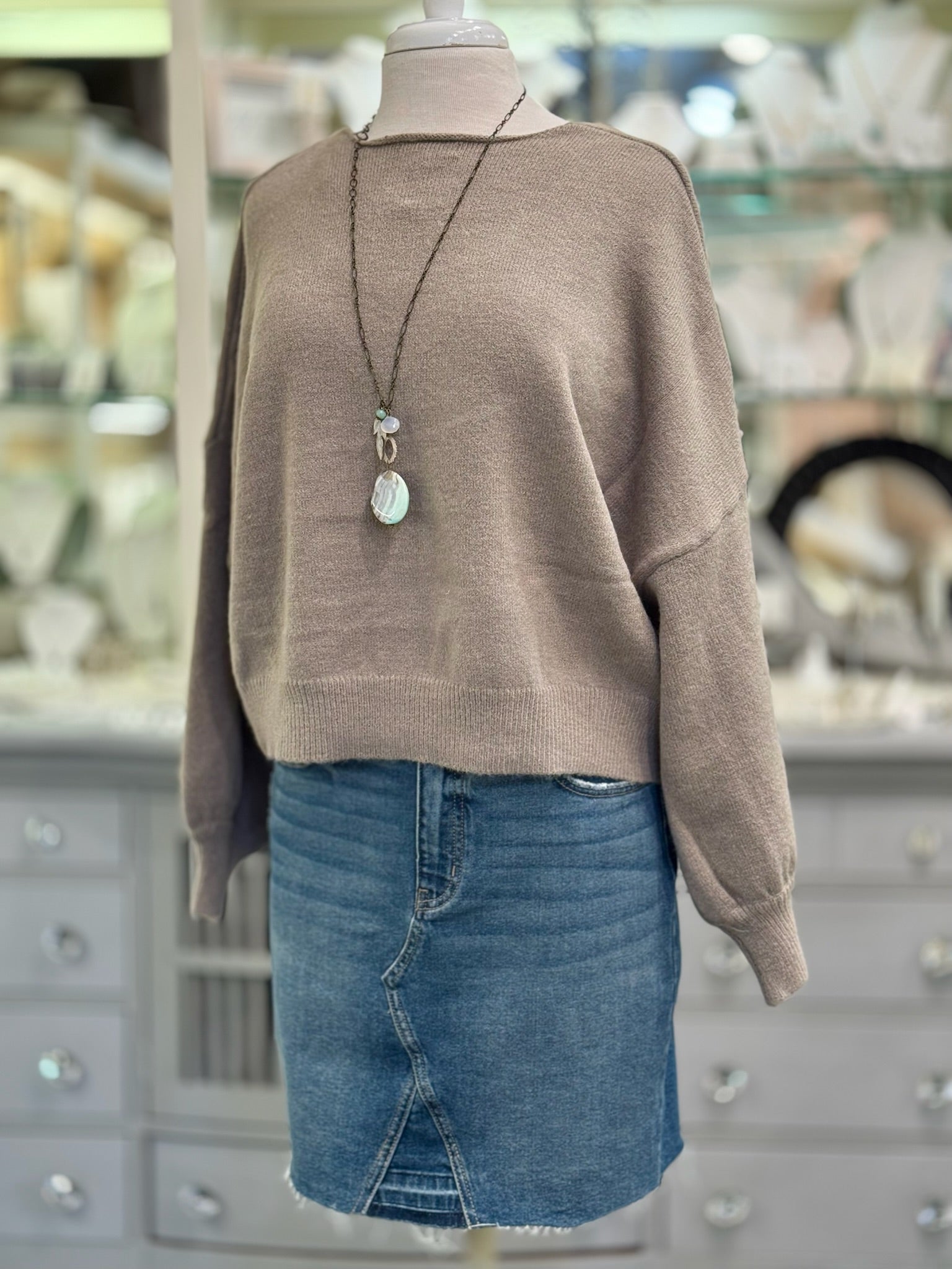 Front view of Ren Reversible Cropped Sweater in mocha worn showing crew neckline.