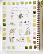 Back cover of the Garden watercolor workbook by Emily Lex showing small garden themed illustrations and color swatches with spiral binding