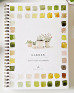 Garden watercolor workbook by Emily Lex with spiral binding and botanical cover art featuring watercolor swatches around the border