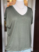 Grace Batwing Short Sleeve Top in olive with a relaxed fit, V-neckline and silver sparkle trim at the neckline and hem at Ardor Boutique.