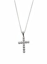 close up of sterling silver cross necklace with sparkling stones from Ardor Boutique