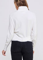 Hazel Wrap Sweater wraps and buttons in the back