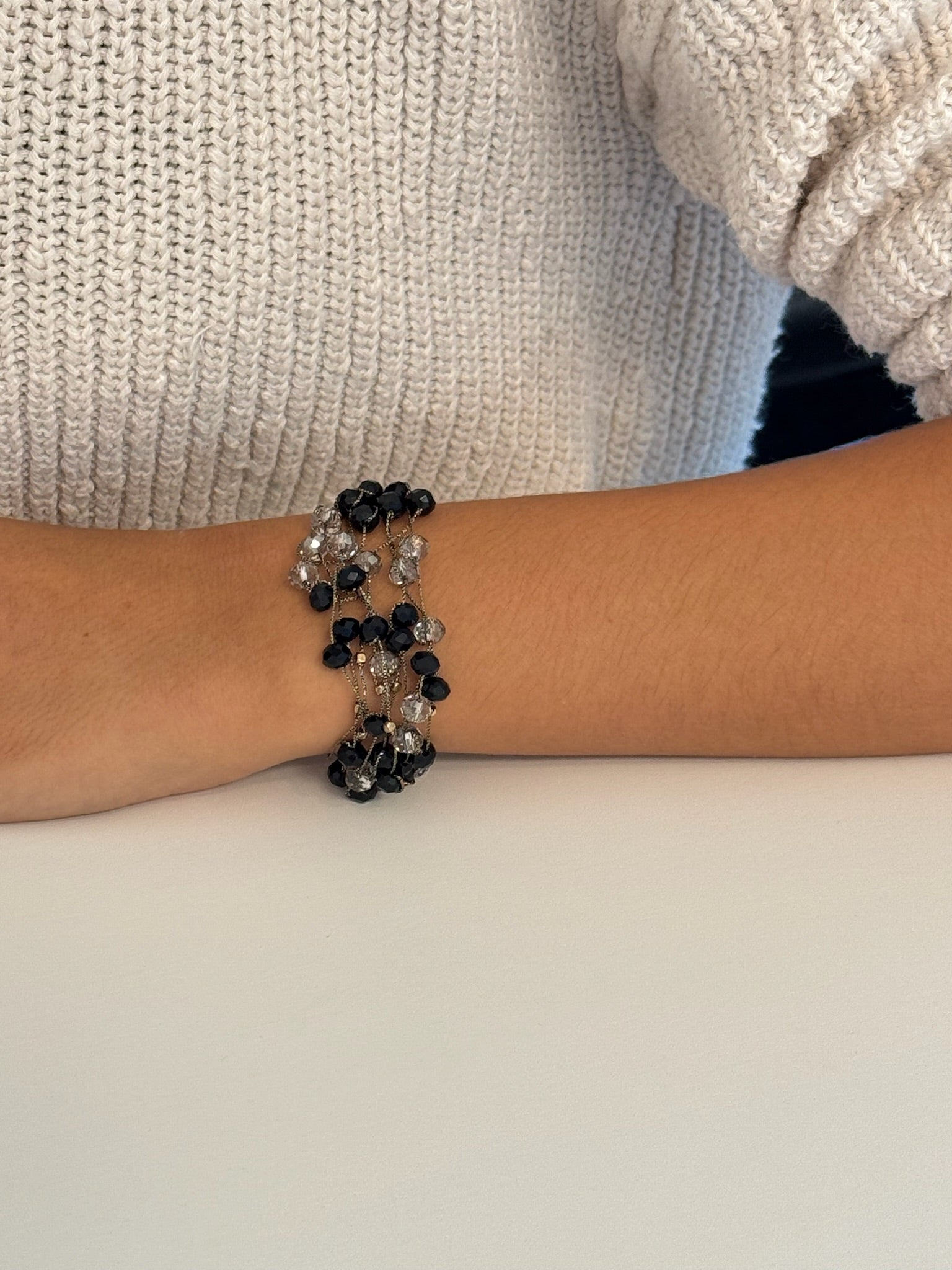 Stella black bracelet on model