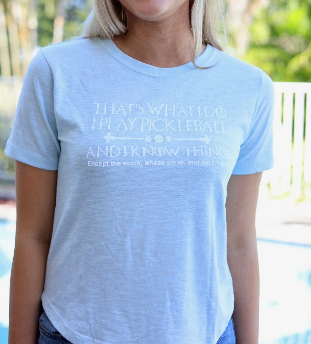women wearing sky blue pickle ball shirt 