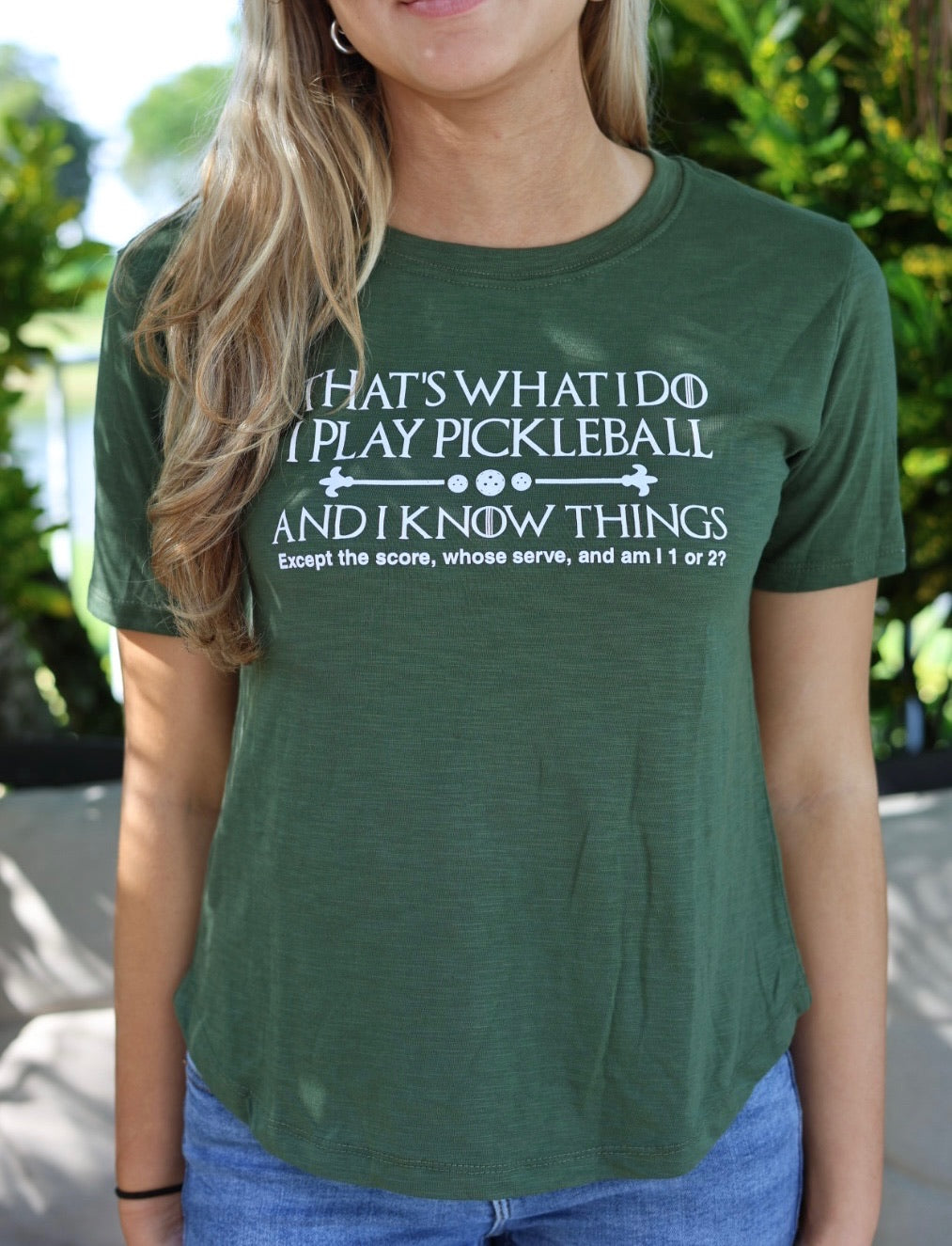 women wearing garden green pickleball shirt 