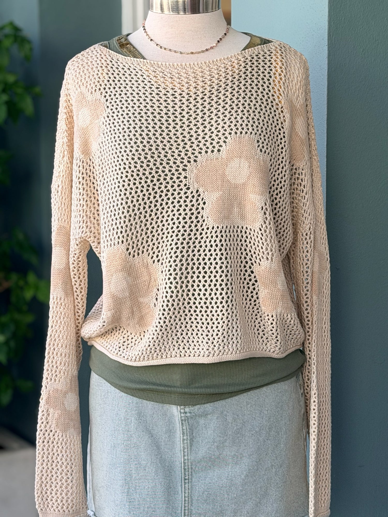 Daisy knit sweater with floral patterns A layered look at Ardor Boutique 