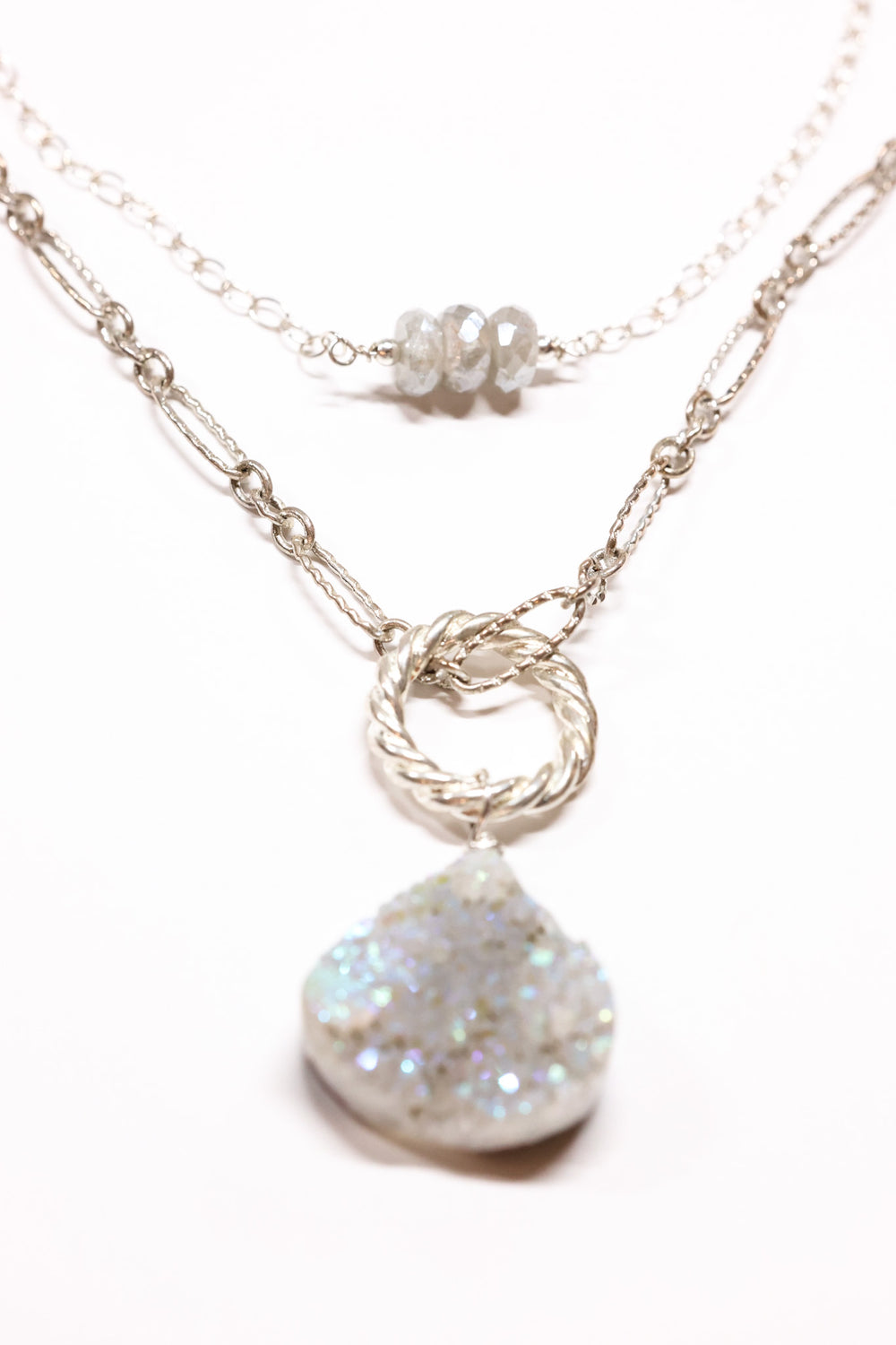 AB Drusy necklace shown layered with shorter necklace