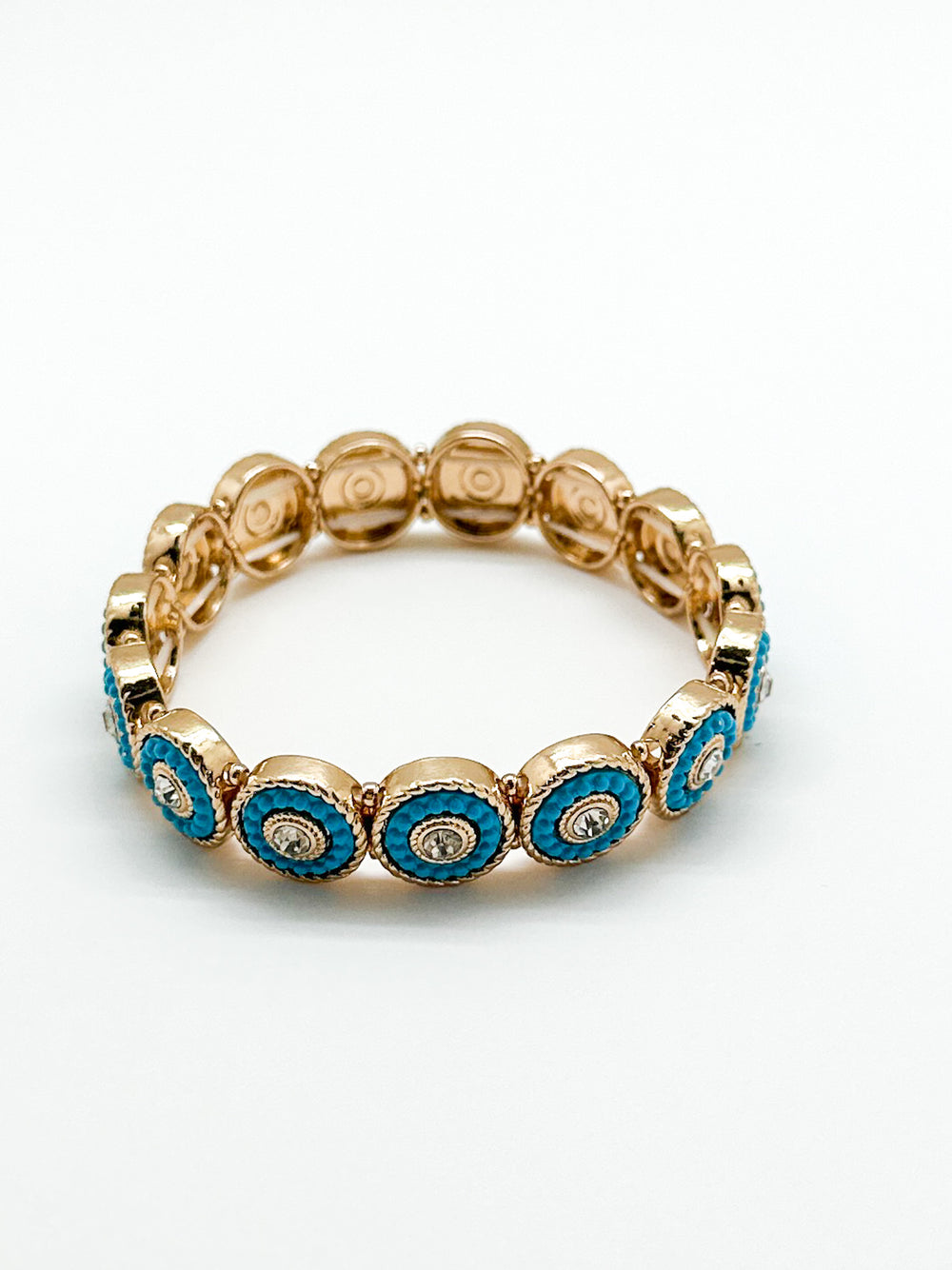 Mabe gold bracelet. gold stretch bracelet with crystals