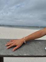 Camille cloisonné bangle in ivory and taupe bamboo design – side view"