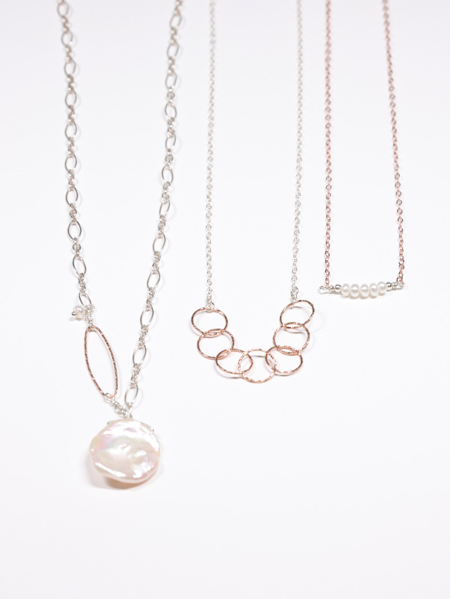 Layering necklace options in rose gold and sterling silver