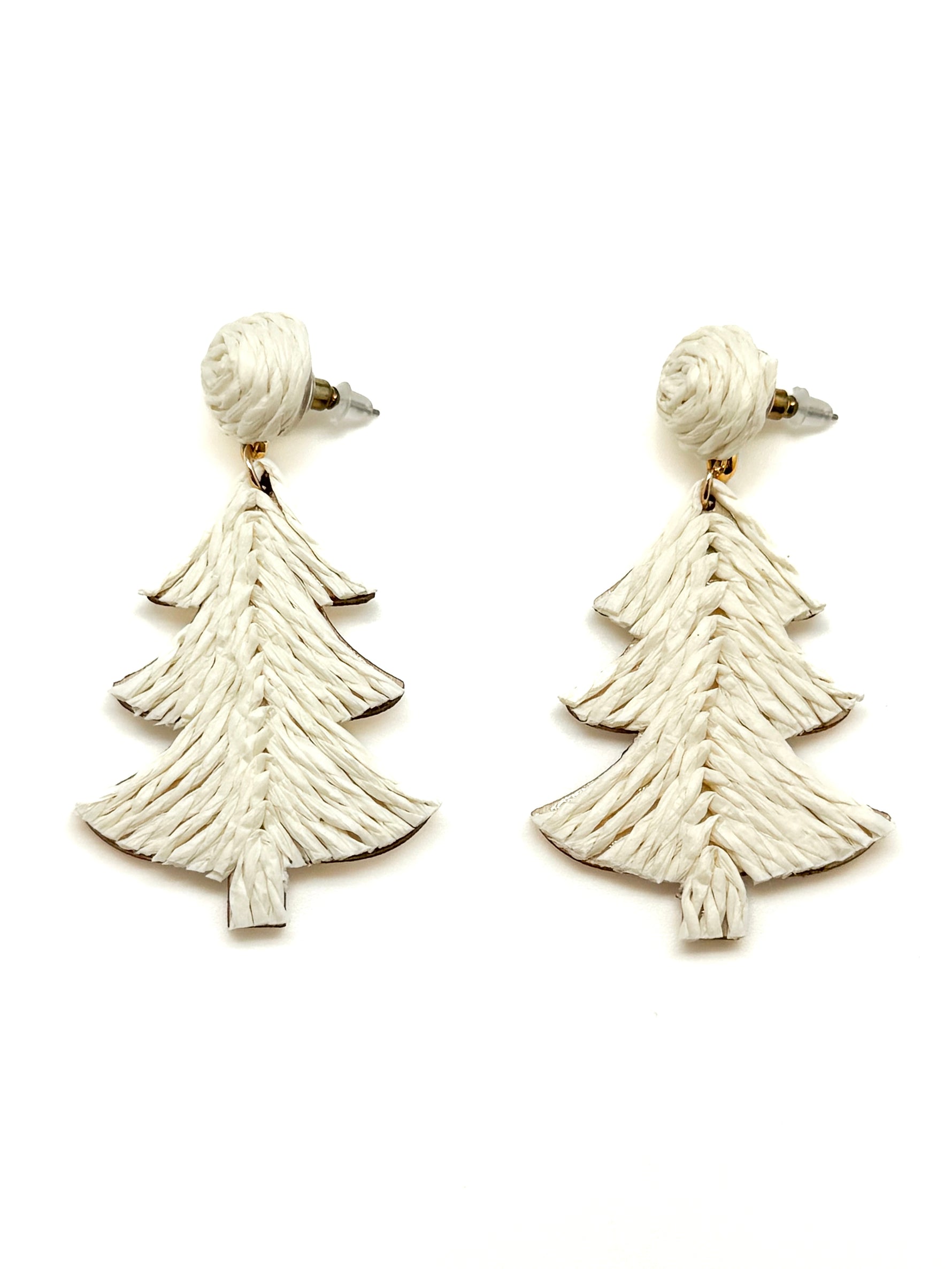 Pair of white Christmas tree earrings on a white background