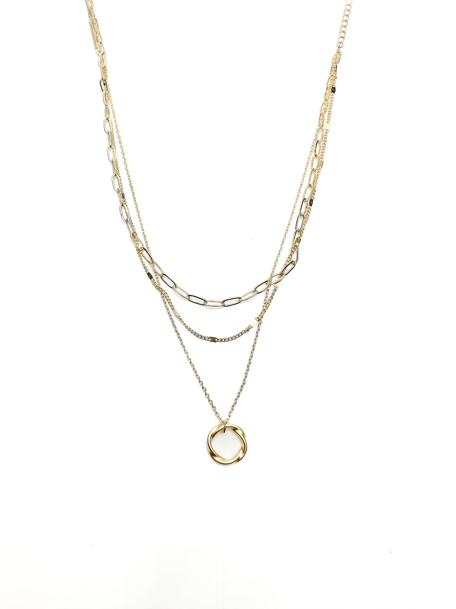 Gold necklaces on a white background