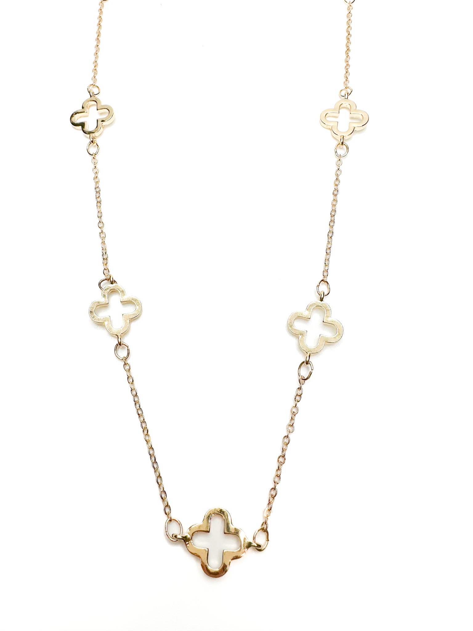 Long clover necklace in gold 