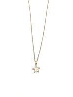 Gold star necklace on a white background