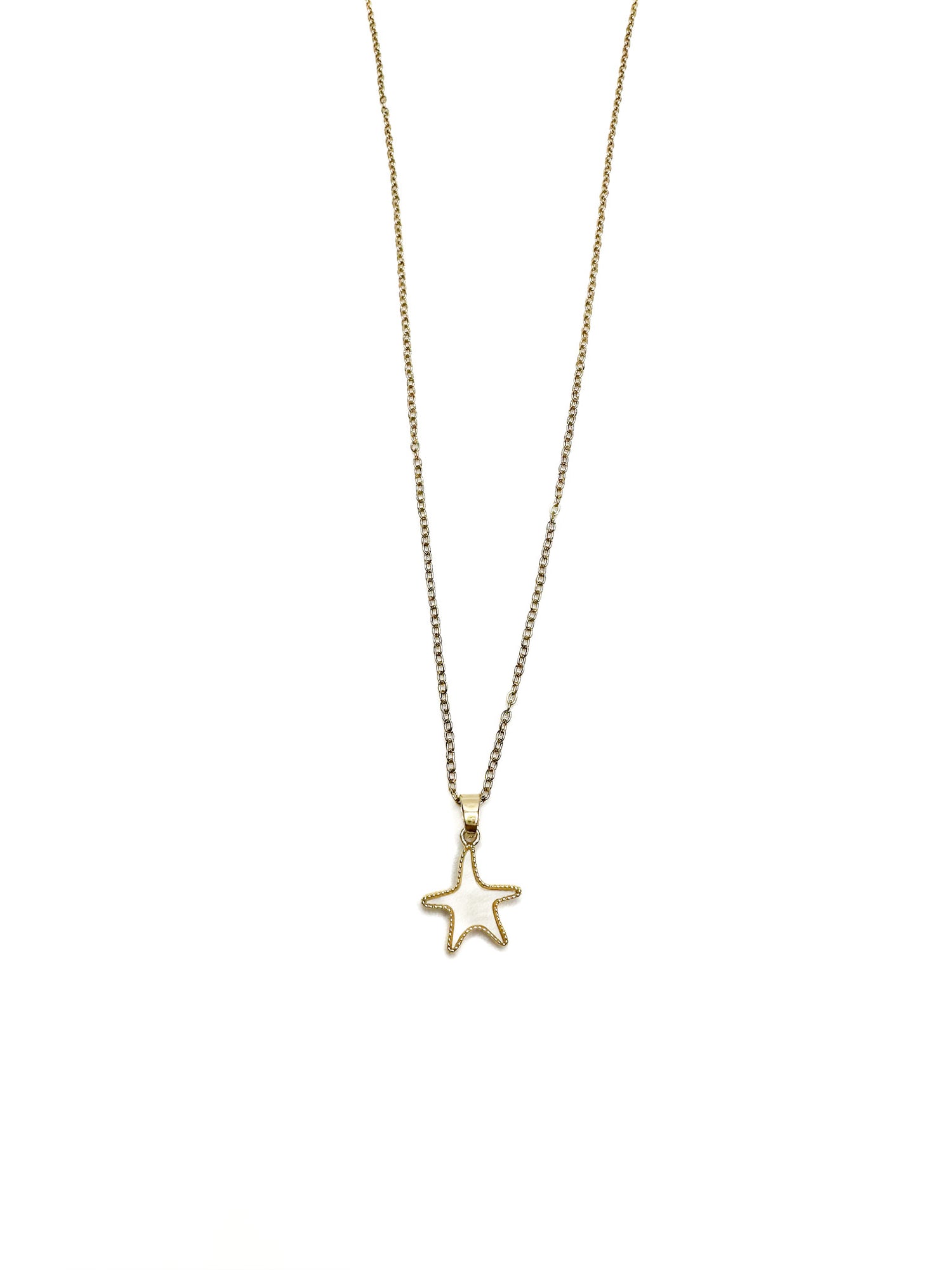 Gold star necklace on a white background