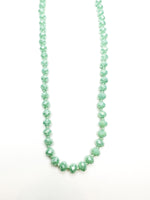 Evie Necklace with faceted aqua-green layered beads at Ardor Boutique.