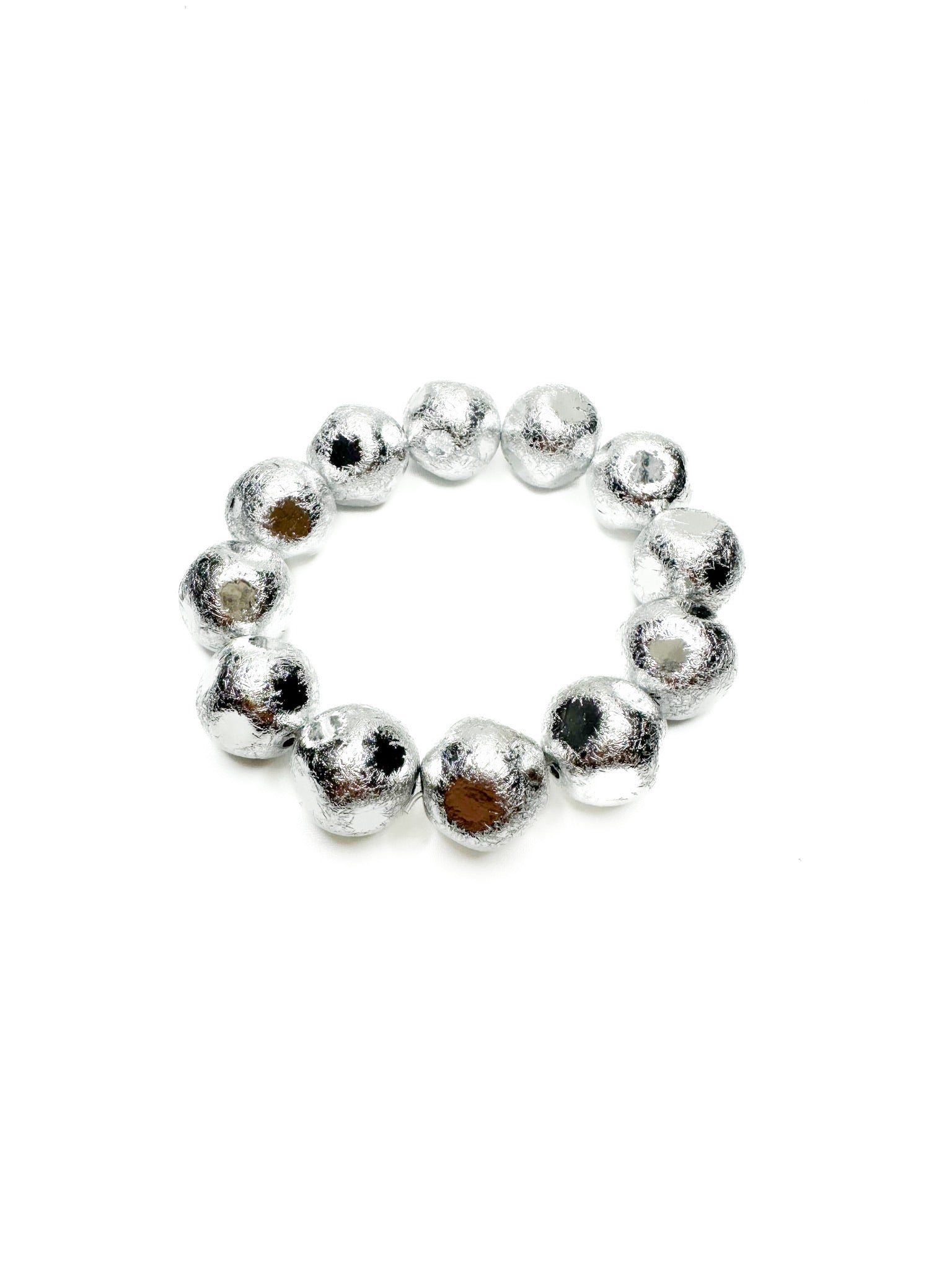 Silver beaded bracelet on a white background