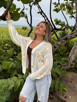 Paislee Pearl Necklace featuring delicate spaced pearls on a gold-tone chain, styled with an ivory floral cardigan, Ardor Boutique.