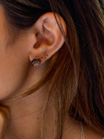 Tabie earrings being worn 