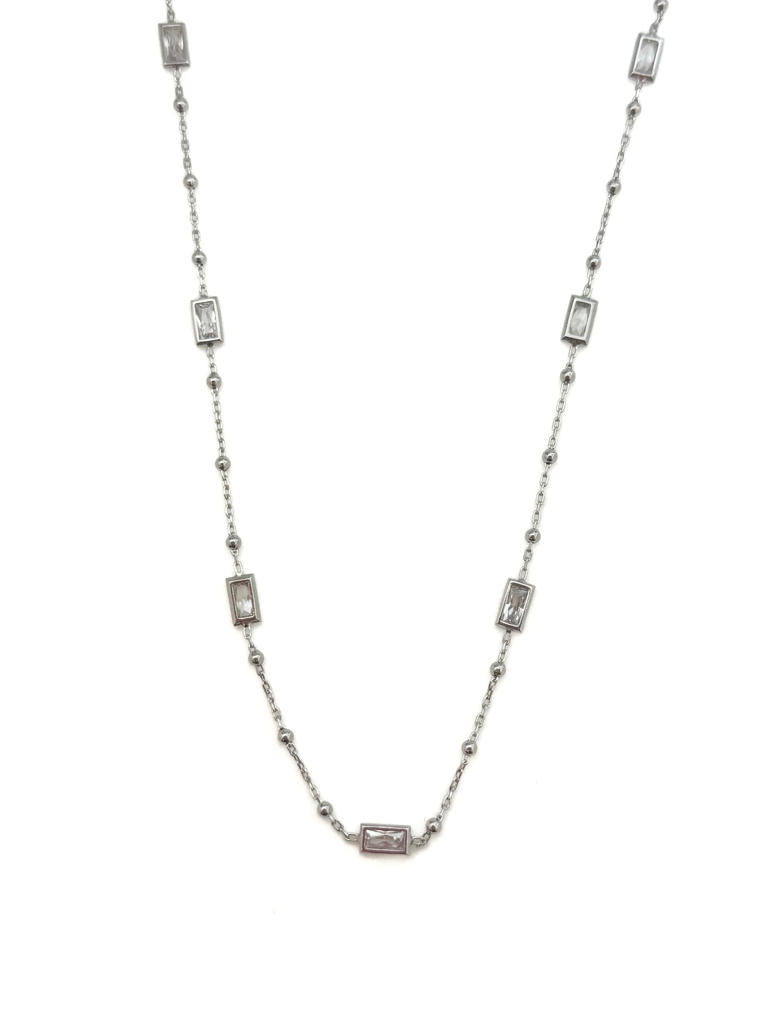 Silver necklace with rectangular beads on a white background