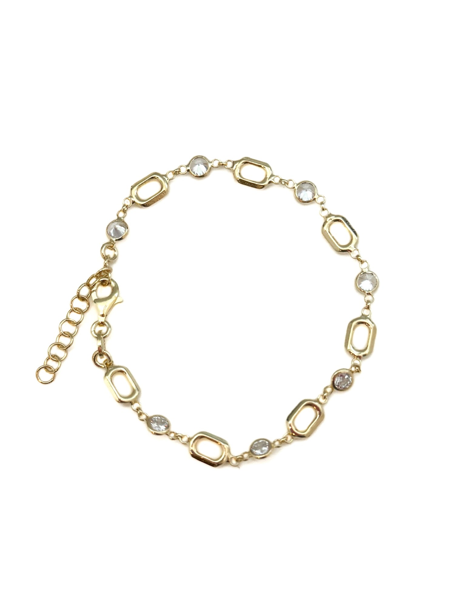 Gold chain bracelet with interlocking links on a white background