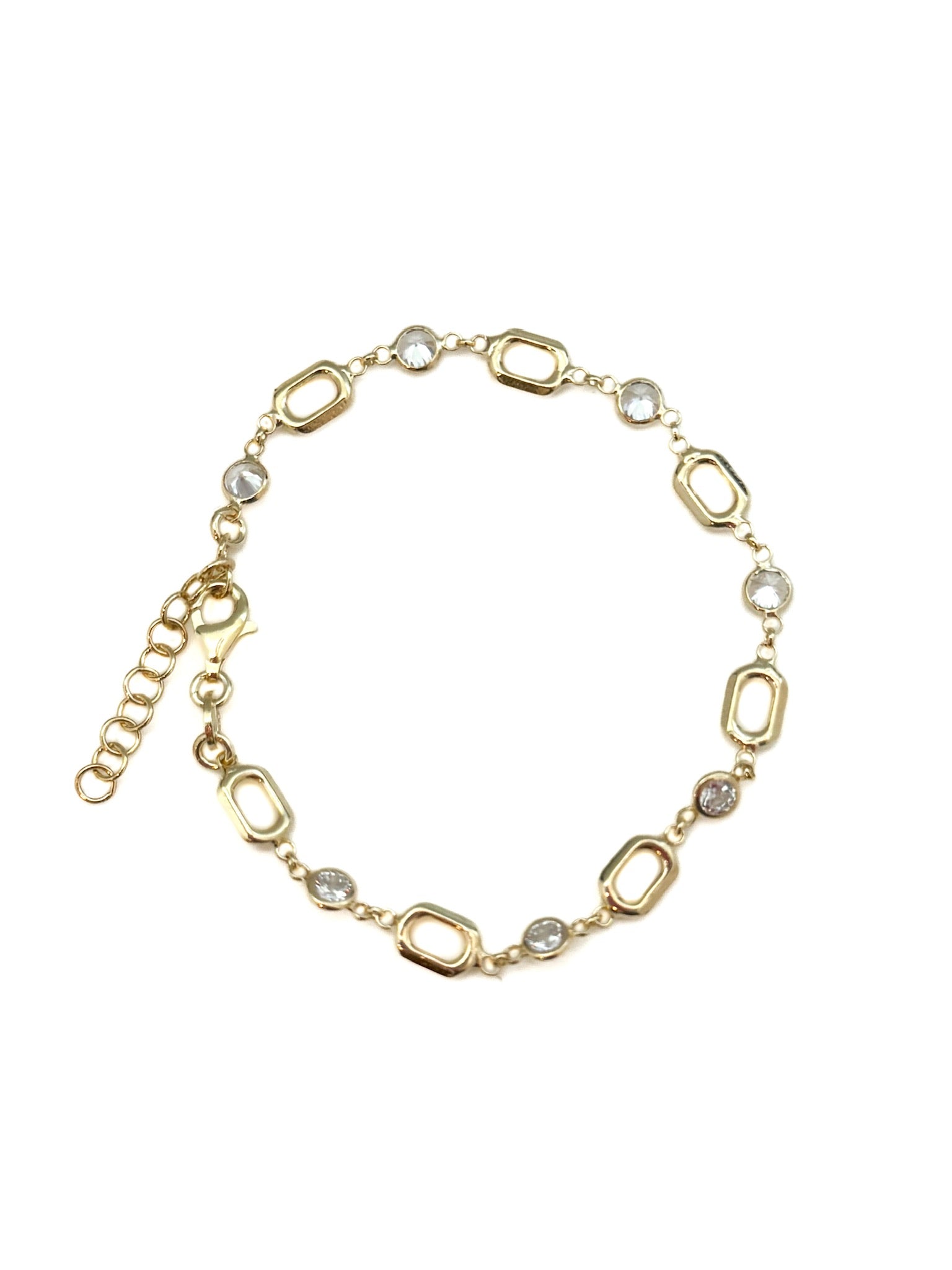 Gold chain bracelet with interlocking links on a white background