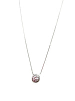 Necklace with a pink gemstone on a white background