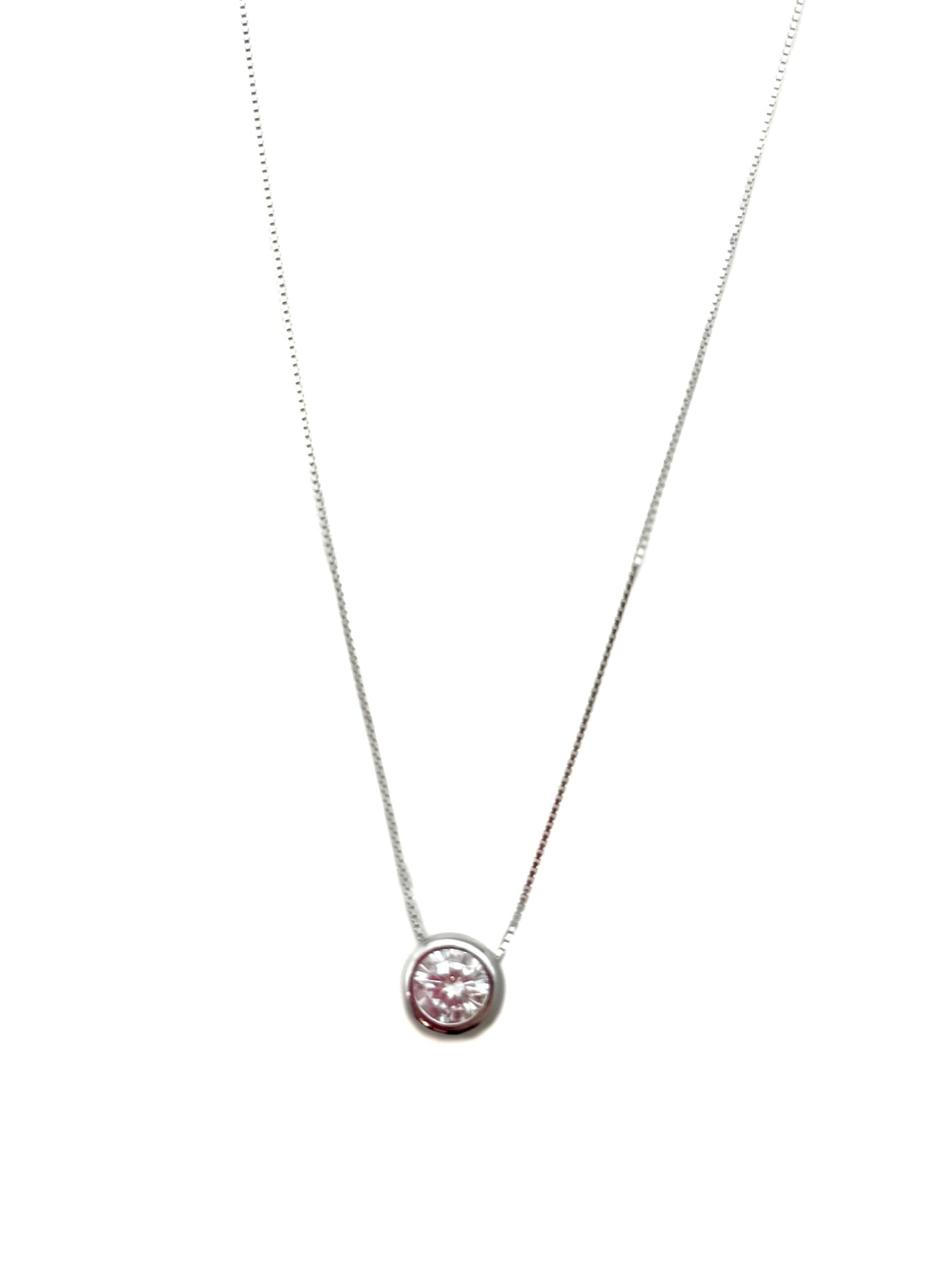 Necklace with a pink gemstone on a white background